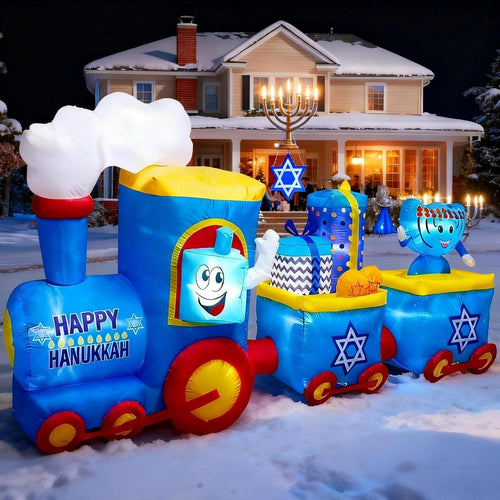 Blue Happy Hanukkah train inflatable with Star of David cars on a snowy lawn in front of a house