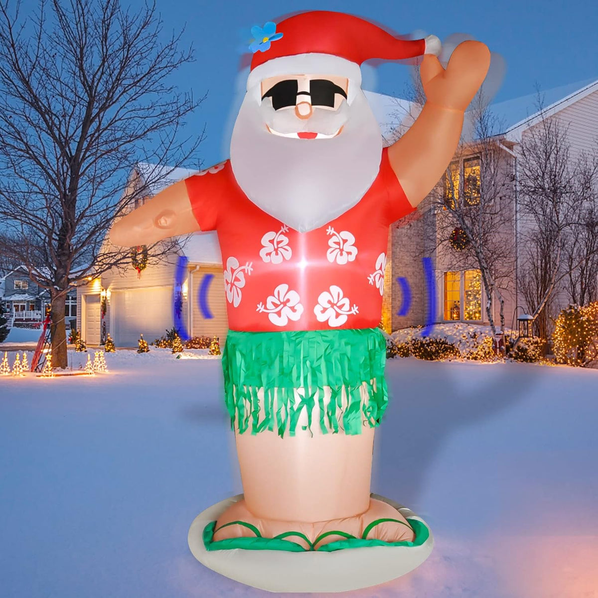 Santa inflatable in sunglasses, Hawaiian shirt and grass skirt in a snowy yard